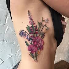 Bouquet Tattoo But With Lupine Sweet Peas And Bleeding Hearts Bouquet Tattoo Neck Tattoo Tattoos