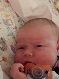 This girl and her eyebrow looks! This is her daddy's face exactly when  being woken up!