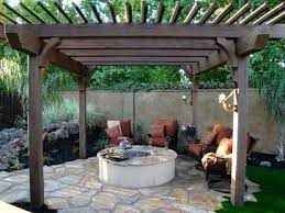 With an adjustable louvered pergola! 33 Cozy And Welcoming Backyard Design Ideas With Fire Pit Pergola Fire Pit Landscaping Fire Pit Backyard