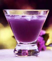 Learn How To Prepare The Best Purple Rain Cocktail Recipe Made With Blue Curacao Vodka Grenadine Cranberry Juice And Yummy Drinks Fancy Drinks Mixed Drinks