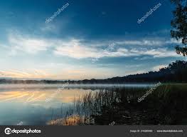Beautiful Red Dawn Lake Rays Sun Fog Blue Sky Lake — Stock Photo ©  MarkoAliaksandr #216390060