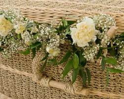 A cooling coffin was kept at the most prestigious homes to keep body contained and aireated until such time as a doctor could arrive to pronounce the person. How To Decorate A Willow Coffin With Flowers Natural Endings Funeral Floral Arrangements Casket Flowers Funeral Floral