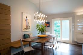 Contemporary Dining Room With Long Wood Table White Chairs And Floating Bench And Multi Bulb Dining Room Light Fixtures Dining Room Lighting Dining Room Bench