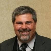 Why does Chicago-style deep dish pizza have a lid/crust