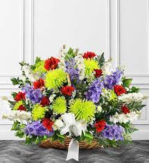 Bright colors or dull colors are fixed in the genetics of a flower. Colorful Sympathy Fireside Basket Avas Flowers