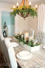 The Best Christmas Table Decorations For All Your Holiday Parties Dining Room Table Centerpieces Dining Room Table Decor Christmas Dining Table