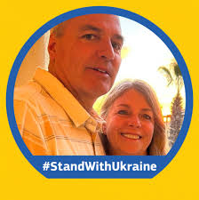 What are some recommendations for restaurants with outdoor seating near the  water in Traverse City for a graduation party?