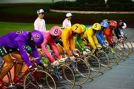 Keirin races in japan begin with all nine bicyclists parading to the starting blocks, bowing as they enter the track and again as they position their bikes for the start of the race. Keirin Kawasaki Racing Cycling Art Track Bike