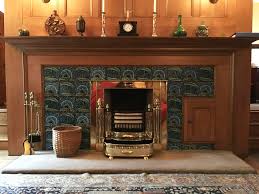 Wet bar with wine chiller and ice machine; William De Morgan In Chicago Glessner House Fireplace Tiles