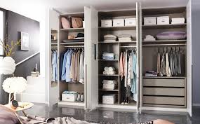 Mastercraft tall wardrobe with patinated brass details. Wardrobe Accessories By Rauch