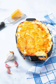 Gratin Dauphinois A Creamy French Potato Recipe Everyone Should Cook Recipe Potato Recipes Gourmet Recipes French French Potatoes