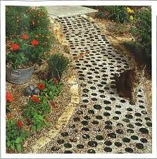 Beer Bottle Garden Path Or Any Colored Glass Bottle Bottoms Now That S A Thought Bottle Garden Garden Paths Garden