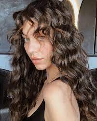 30 Trendy Curtain Bangs You Ll Be Seeing Everywhere In 2021 In 2021 Long Curly Haircuts Curly Hair Trends Curly Hair With Bangs