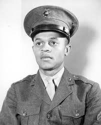 Frederick C.Branch,of Charlotte,NC,was the first African American to be  commissioned in the Marine Corps,his wife is pinning