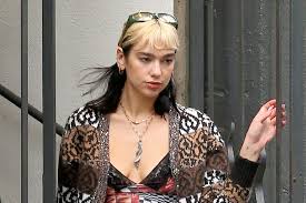 It's going to be everywhere this summer. Dua Lipa Shows Off New Bleached Breakage Bangs