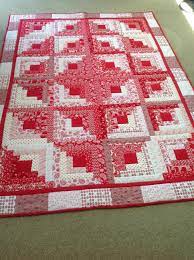 This board is a collection of log cabin quilts showcasing various layouts. Pin On Quilts
