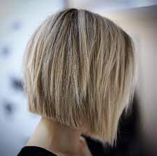 Short angled bob with bangs. 15 Best Blonde Bob Hairstyles For 2020