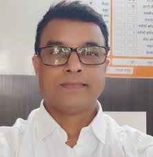 Why is sugar solution a non-electrolyte?