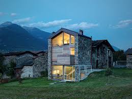 Stone cottage construction brings a combined 60 years of experience to the process of building. Modern Alpine House With An Extensive Use Of Timber And Stone Digsdigs