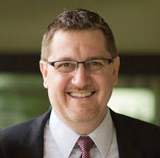 THE MAN BEHIND THE MAGIC