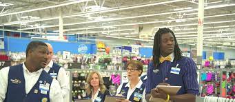 You can work as a cashier st 14 and up with a workers permit. Working At Walmart