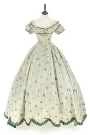 New gowns are newly made, styled after 1860s fashions, though not strictly period correct unless labeled as such. Evening Dress Ca 1860 Kerry Taylor Auctions Via Fripperies Fobs Victorian Fashion Historical Dresses Vintage Gowns