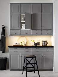 The voxtorp series has a smooth door with integrated handles. Grey Wall And Base Cabinets With Black Worktop Ikea Bodbyn Kitchen Grey Kitchen Cabinets Home Kitchens