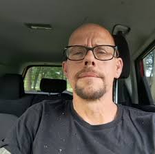 What are suitable trails in lower Michigan for motorcycle camping?