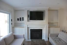 Next, you can see the cabinets starting to take shape here, and the back of the wall that would run up from the mantle. How To Design And Build Gorgeous Diy Fireplace Built Ins The Sweetest Digs