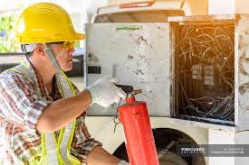 Disconnecting the electricity download article. Electrician Using A Fire Extinguisher To Put Out An Electrical Fire Thailand Outdoors Protection Stock Photo 460987810
