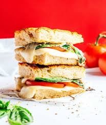 Place sandwich in hot pan. The Best Caprese Panini Mozzarella Tomato And Pesto Live Eat Learn