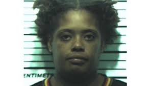 Woman arrested after Davenport duplex fire