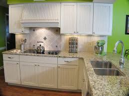 Image Result For White Vertical Slatted Kitchen Cabinet Doors Small Cottage Kitchen Cottage Kitchens Country Kitchen Backsplash