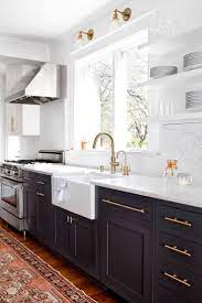 Maybe you would like to learn more about one of these? Navy Blue Cabinets Brass Hardware Belfast Sink Marbled Countertops Kitchen Decor Inspiration Kitchen Design Kitchen Inspirations