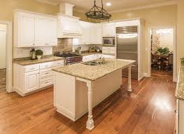 Coordinating kitchen cabinets and flooring requires working with the hue and tones of each hardwood, according to hardwood bargains. Cabinet Refacing Tips Mix Match With Hardwood Floors N Hance