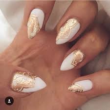 White Almond Acrylic Nails With Gold Henna Design Gold Nail Designs Simple Stiletto Nails Gold Nail Art