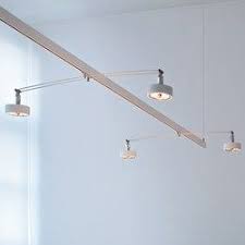 The ceiling is ~16ft at the table and has a sloped ceiling. Suspended Track Lighting For Vaulted Ceilings Pictures To Pin On Living Room Lighting Track Lighting Lighting Inspiration