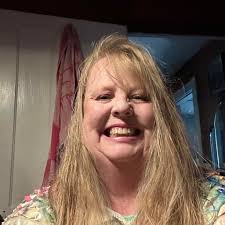 What resources are available for financial assistance for breast cancer  patients?