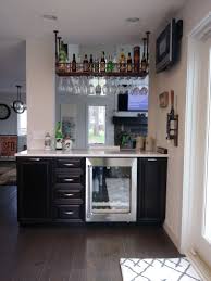 Cabinet made of solid mango wood. Valley Custom Cabinets Dry Bar Area