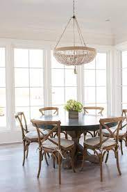 Table Finish Rivets Chairs Cool Too 50 Favorites For Friday Dining Rooms Round Dining Room Kitchen Lighting Over Table Round Kitchen Table