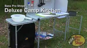 Enjoy lots of room to prepare food, set supplies on, or handle the camp stove with a main table top made of heat resistant mdf flanked by a wire side table on one. Bass Pro Shops Deluxe Camp Kitchen Youtube