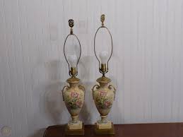 It features a scalloped porcelain tea jar base decorated with. Pair Of Vintage Urn Style Hand Painted Floral Design Porcelain Table Lamps 1837401558