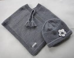 Hand knitting crochet for kids crochet baby. Poncho And Daisy Hat Set Hand Knitted Wool Baby Poncho And Hat Hand Knitted Poncho With Hat Han Hand Knit Poncho Baby Poncho Baby Girl Knitting Patterns