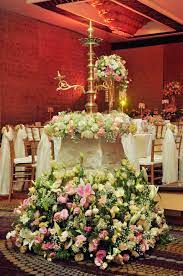 The Traditional Oil Lamp Received A Beautiful Facelift For Puthula S And Janaka S Wedding Held At Cinnamon Gran Wedding Wedding Decorations Traditional Wedding