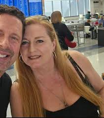 I lost my beautiful daughter yesterday. After a 2 year battle with ovarian  cancer. Can someone please remove this man from this picture please? I  tried cropping it but I dont want