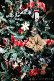 Red & black buffalo check ball ornaments feature shatterproof, plastic ball shapes, red and black buffalo check cloth coverings, glittered evergreen details and pinecones. Rustic Red Black Burlap And Buffalo Check Christmas Tree The Craft Patch