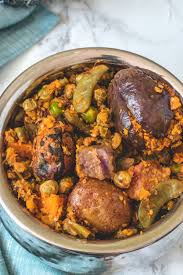 Undhiyu, a gujarati delicacy made with lots of vegetables coated with lots of spices, fresh coconut, sesame seeds, peanuts, cilantro, garlic, ginger and oil, cooked into an instant pot. Surti Undhiyu Instant Pot Spice Up The Curry