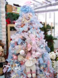Being able to see the blue and silver shimmery christmas tree in the background is stunning and such a highlight in the dining room space. Blue Christmas Tree Decorating Ideas Adding Cool Elegance To Winter Holiday Decor