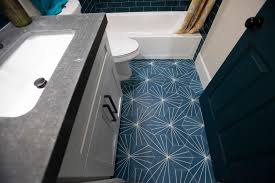 We offer hundreds of tile styles and colors we have a wide selection of floor, wall and mosaic tiles made from durable glass, porcelain and natural stone. Contemporary White Bathroom With Blue Tile Floor Hgtv