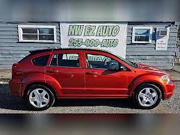 Image result for Sunburst Orange 2009 Caliber